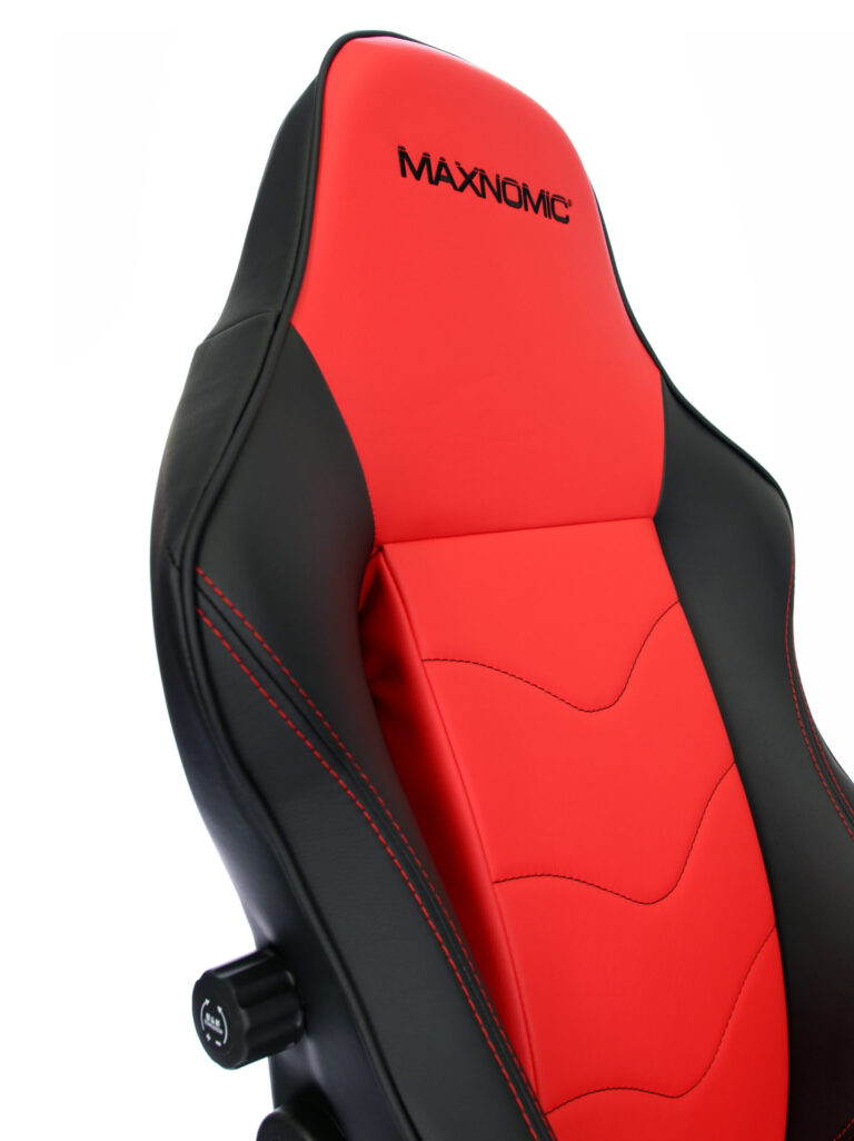 Close-up of the backrest of the Maxnomic® Leader Red with black embroidered Maxnomic® logo.