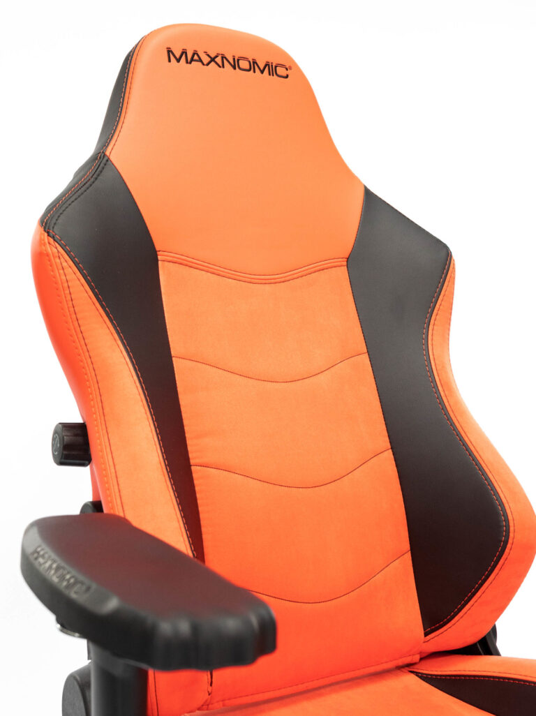 Rückenlehne und Armlehne des Maxnomic® Leader Executive Edition Orange.