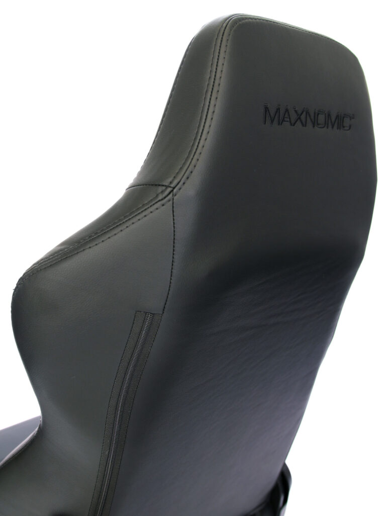 Backrest of black gaming chair from behind