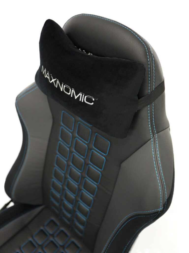 eSports chair model QUADCEPTOR OFC from Maxnomic® in Brilliant Blue. A black office chair with square stitching, blue seams and headrest cushion.