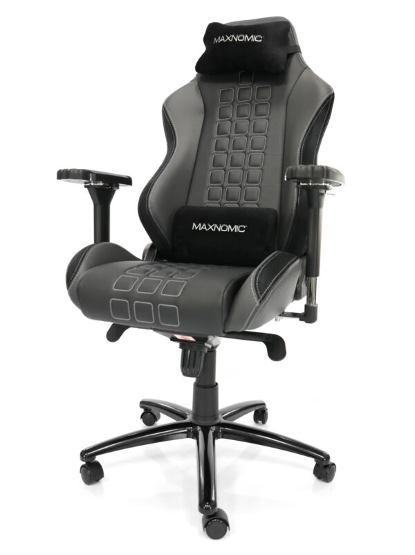 eSports chair model QUADCEPTOR Pro from Maxnomic® in Slightly Silver. A black office chair with square stitching, silver seams and head and lumbar cushions.