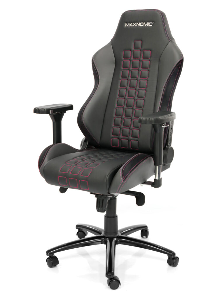 eSports chair model QUADCEPTOR Pro from Maxnomic® in Rasberry Red. A black office chair with square red stitching, turned slightly to the left.